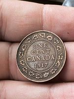 Reverse of 1917 Canadian one cent with date and maple leaf wreath