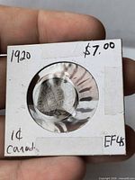 Front of holder showing reverse of coin