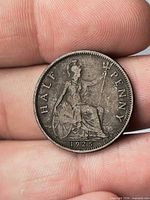 Reverse side showing seated Britannia, denomination wording and date 1925