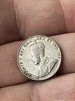 Obverse showing King George V portrait and legends