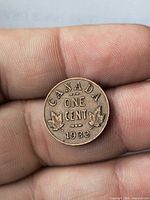 Reverse showing CANADA ONE CENT 1932 with maple leaves