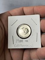 Reverse showing rabbit design, denomination and dates