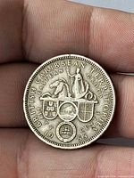 Reverse showing seated figure, shields, legend British Caribbean Territories Eastern Group and date 1955