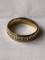 Ring showing outer band of clear stones