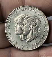 Reverse of 1981 Royal Wedding Crown featuring Prince Charles and Lady Diana facing busts