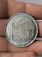 Obverse showing Bourbon Street carriage scene, surrounding text