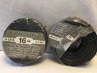 Two labeled rolls of Work-Savers 16 ga black steel tie wire, packaging intact