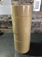 Stack of six Anchor masking tape rolls