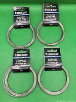 Front view of four wire coils with packaging