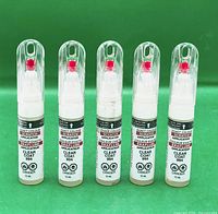 Front view of five identical PlastiKote scratch applicator pens