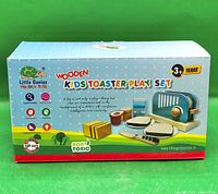 front of boxed Little Genius Wooden Kids Toaster Play Set showing contents illustration and age 3+