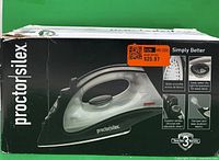 Front of retail box showing Proctor Silex steam iron image and branding