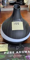 Wood-look aroma diffuser with sticky note label