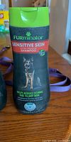 Front of FURminator Sensitive Skin dog shampoo bottle