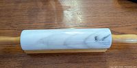 Rolling pin on stand, marble cylinder with wooden handles