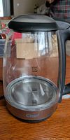 Full view of MasterChef clear glass kettle with handle and lid