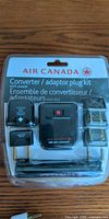 Front of sealed Air Canada converter/adaptor plug kit package