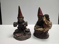 Both Tom Clark gnome figurines front view