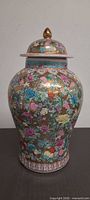 Full frontal view of lidded ginger jar showing overall pattern and shape