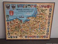 Full view of framed pictorial map poster