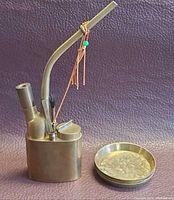 Pipe and stacked dishes front view