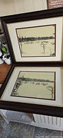 Both framed elk photographic prints displayed together