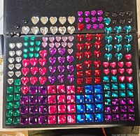 Full board view showing quantity, both heart and square rhinestones in multiple colours