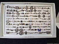 Full view of tray showing all rings in rows