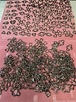 overview of large quantity of bezel frames spread on surface