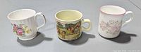 Three bone china cups side by side
