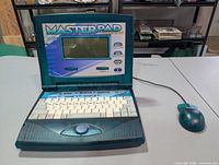 Laptop open showing screen, keyboard, exterior colour