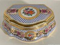 Overall view of Limoges porcelain jewelry box with lid in place