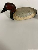 Left side view of carved wood canvasback duck decoy