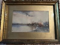 Full view of framed watercolor landscape under glass