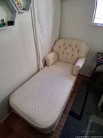 Full view of chaise lounge showing overall design and upholstery