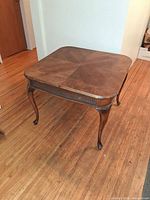 Full view of square coffee table top and legs