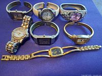 All seven watches laid out