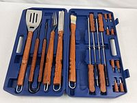 full view of opened case showing all utensils