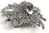 Back view showing silver-tone metal and clasp