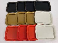 Top view of all twelve trays grouped by color