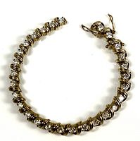 Full view of bracelet in oval shape showing entire design