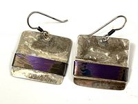 front view of hammered sterling square earrings with purple bar