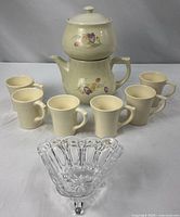 Full lot view with coffee pot assembled, six mugs and crystal candy dish