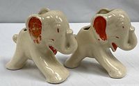 Both Hull Stretch Elephant planters side by side showing overall condition and color