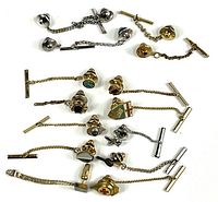 Full view of collection showing tie tacks and extra chains