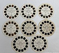 Nine View-Master reels laid out in three rows showing titles and slide frames