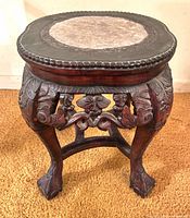 Full view of carved plant stand