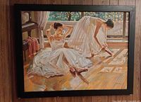 Full view of framed art print on wall