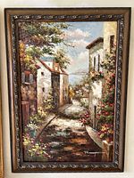 Full view of framed Mediterranean village oil painting