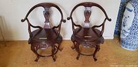 Pair of horseshoe-back chairs front view